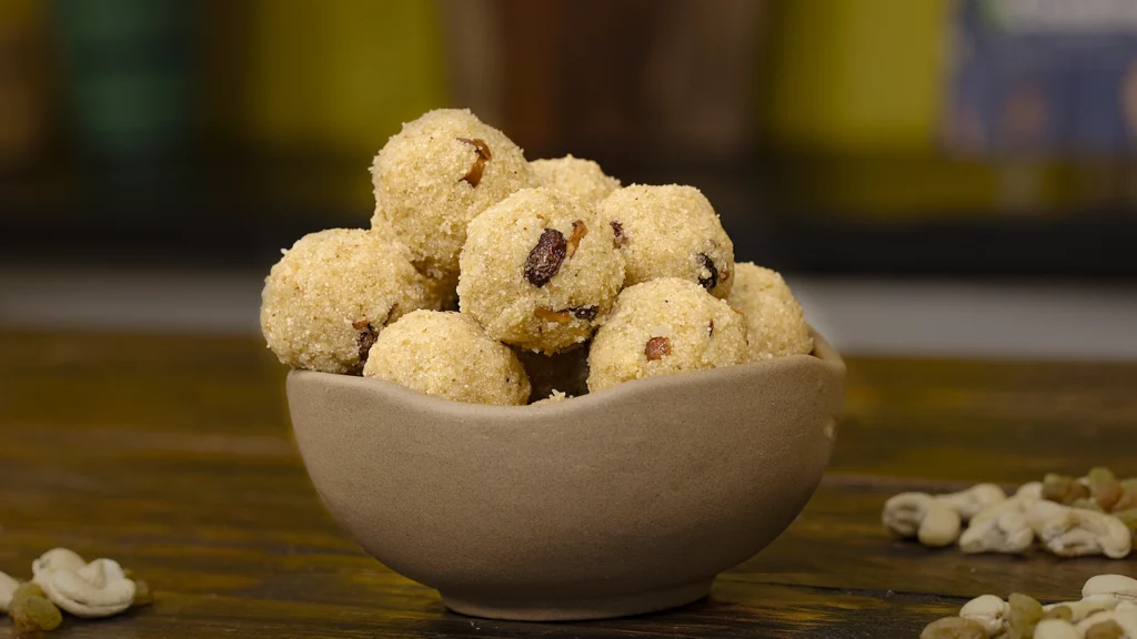 Easy Indian Picnic Menu Ideas: Recipes That Travel Well 11 Freshly made rava ladoos on a plate