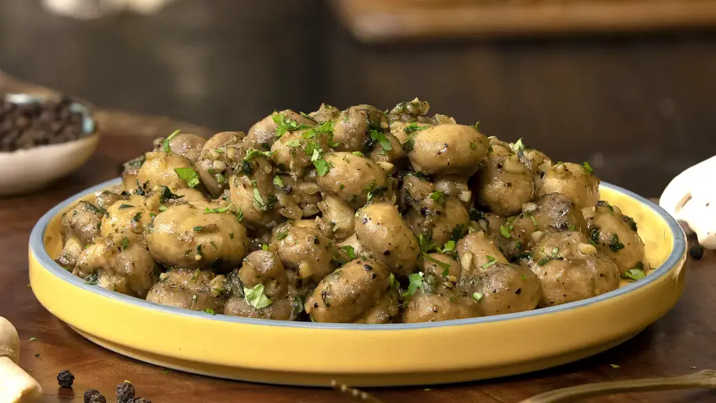 Creamy butter garlic mushrooms on a plate