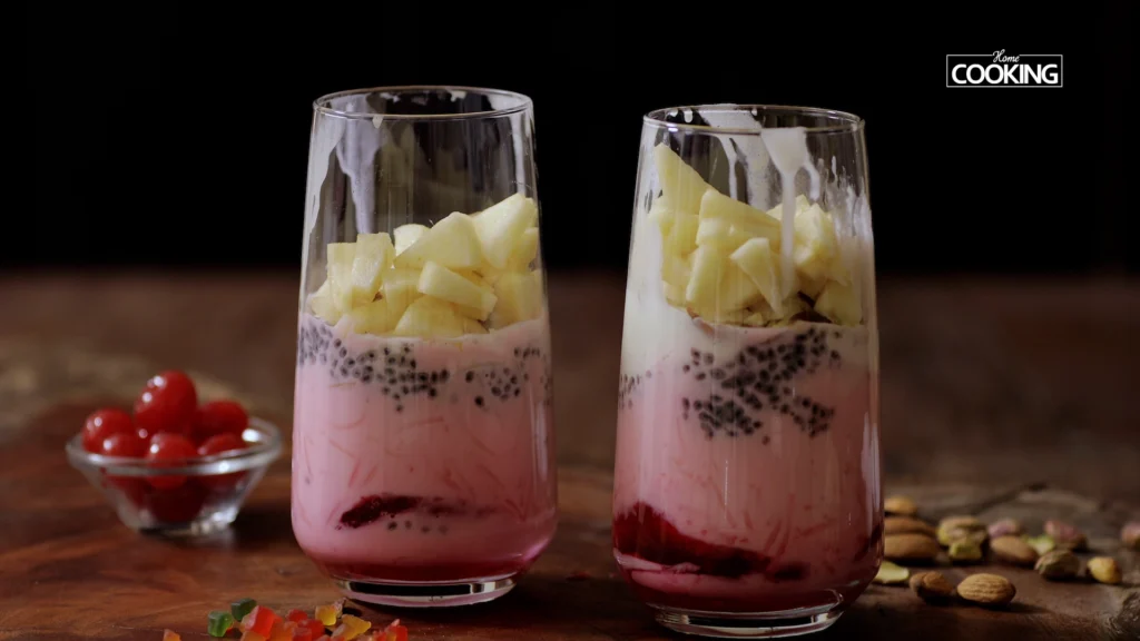 Lazy Mornings, Hearty Bites: Brunch Recipes to Brighten Your Day 42 Fresh fruit pieces being added to the glass