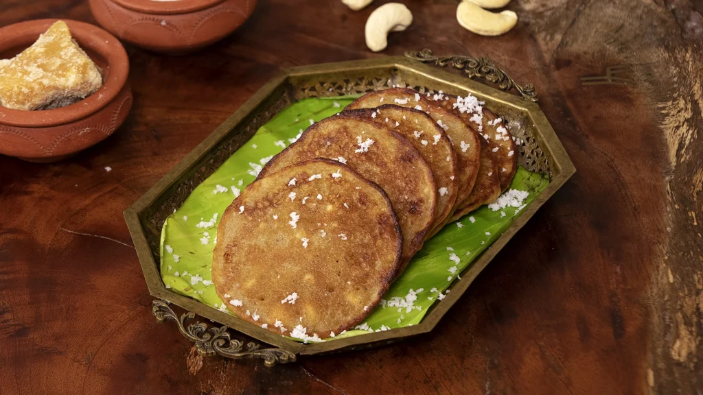 Lazy Mornings, Hearty Bites: Brunch Recipes to Brighten Your Day 9 Freshly made banana dosas on a plate, garnished with coconut