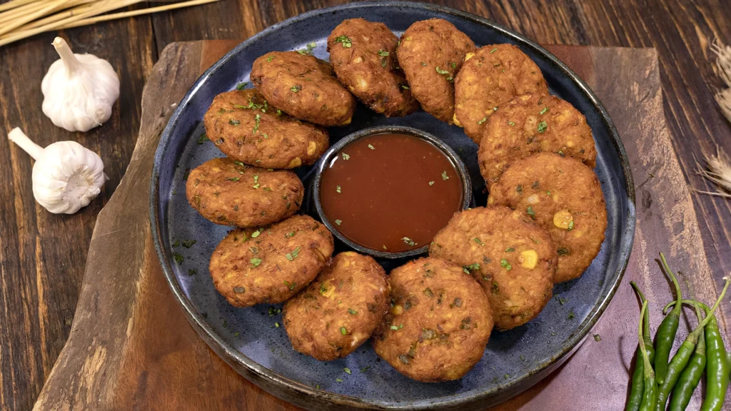Gluten‑Free Indian Recipes to Elevate Your Table 17 Crispy corn cutlets served with ketchup