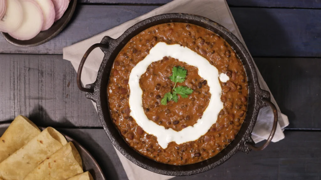 Delicious Indian Curries & Gravies You’ll Want to Eat Every Day 6 Dal makhani garnished with cream and coriander