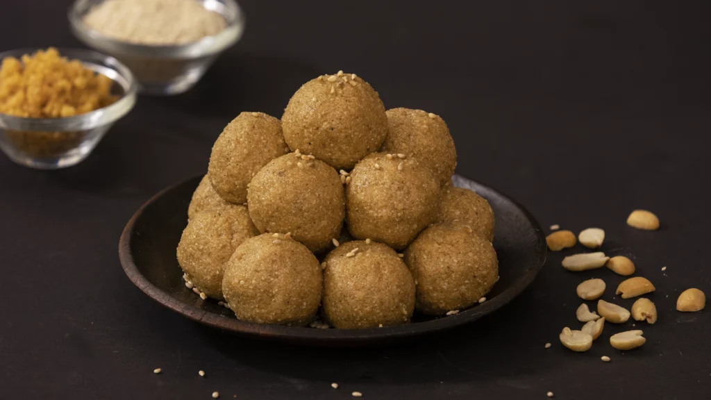 Back-to-School Snack & Lunch Box Recipes: Tasty, Nutritious, and Kid-Approved 8 Plate of sesame laddoos ready to enjoy