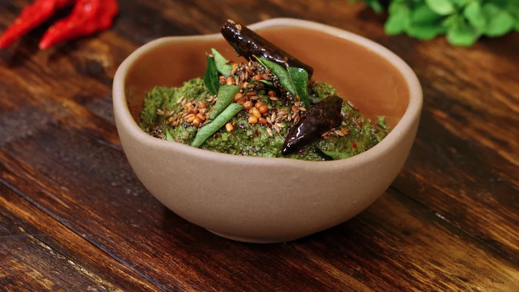 15 Chutneys, Pickles & Podis to Serve with Dosa and Idli 6 Bowl of mint chutney topped with golden tempering