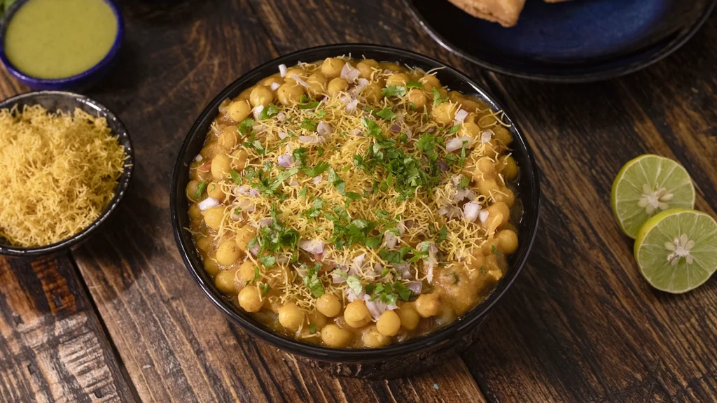 Finished chaat in bowl, garnished and bright