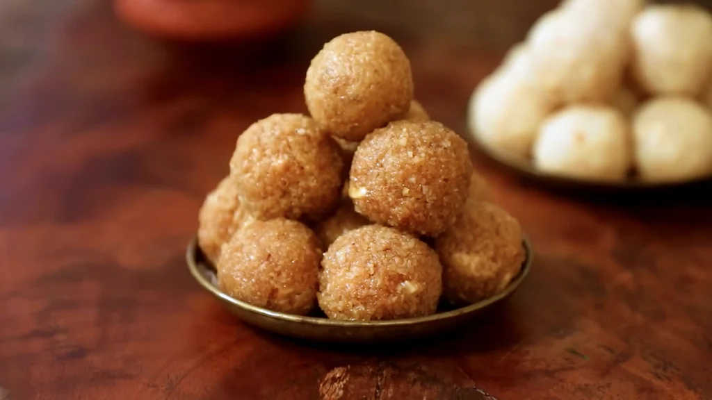 plate of finished jaggery coconut ladoos ready to eat
