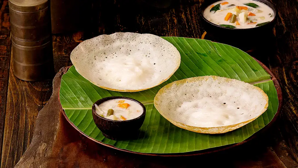 Christmas Recipes of India by Region 5 plated appams with coconut milk or stew
