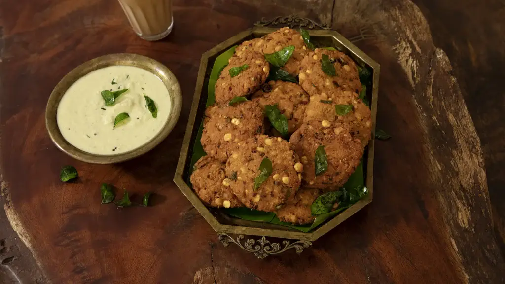 South Indian Breakfast Recipes 5 plated masala vada with chutney and fried curry leaves